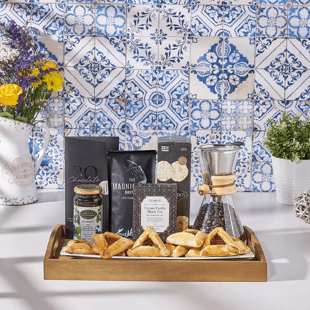 Delicious pastries and tea setup on a wooden tray with blue patterned tiles background.