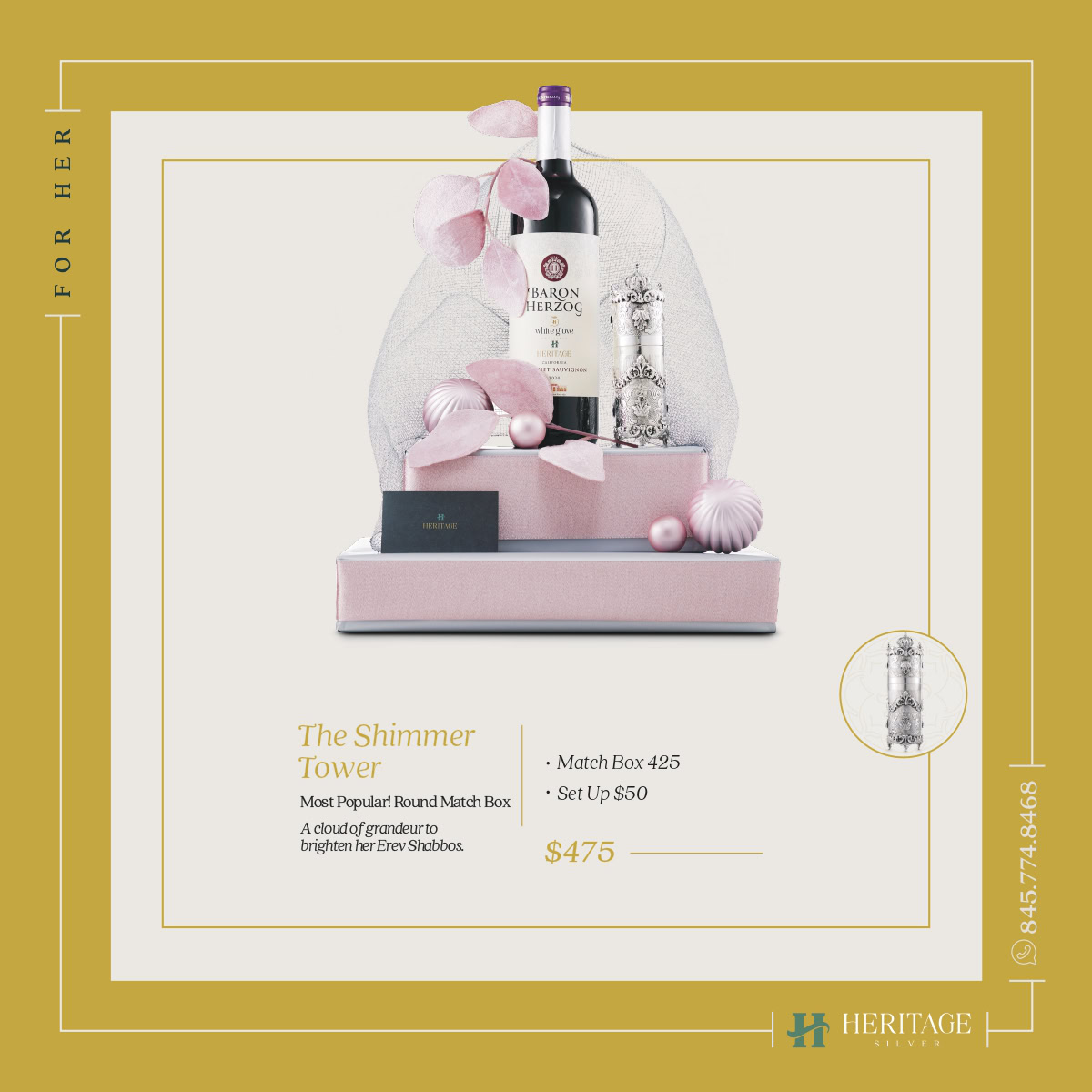 Elegant wine gift set with pink accents and decorative elements.