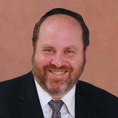 Celebrant smiling at the Gateways Shavuos Program 2026 in Tarrytown, NY, during a joyful community e.